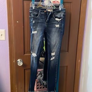 Blue skinny jeans. Ripped. Slim fit. Low-rise